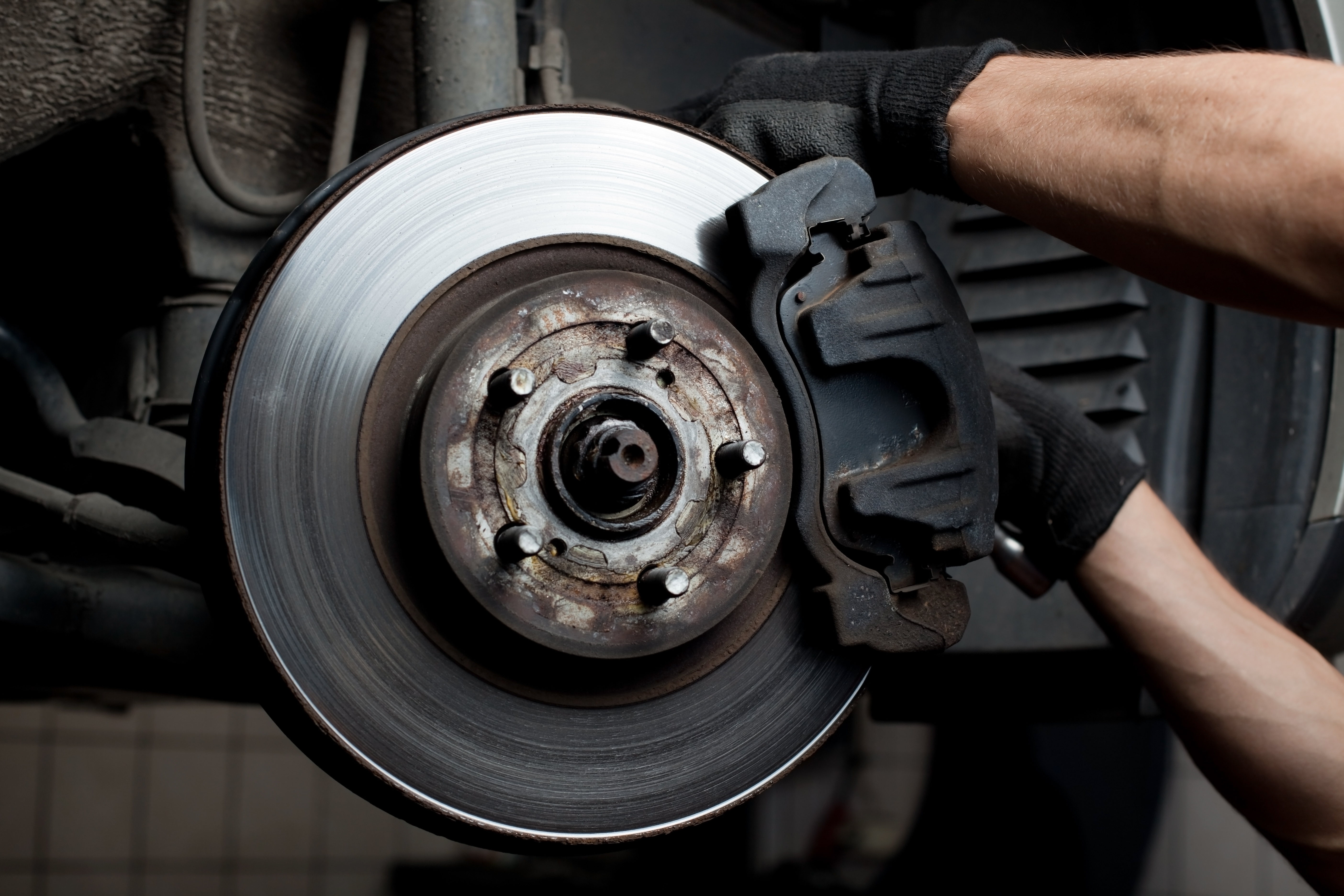 Close-up of brake rotor and caliper assembly components